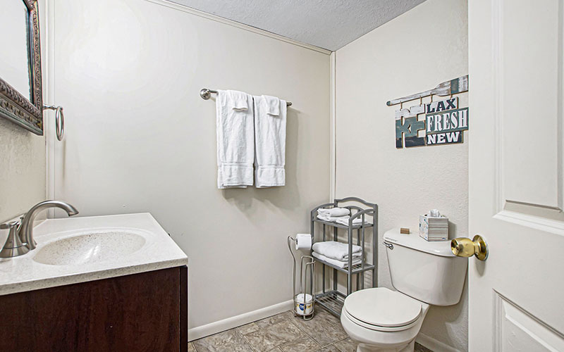 bathroom in vacation rental suite in pentwater at channel lane inn