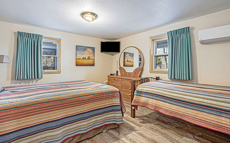 vacation rental bedroom in pentwater at channel lane inn